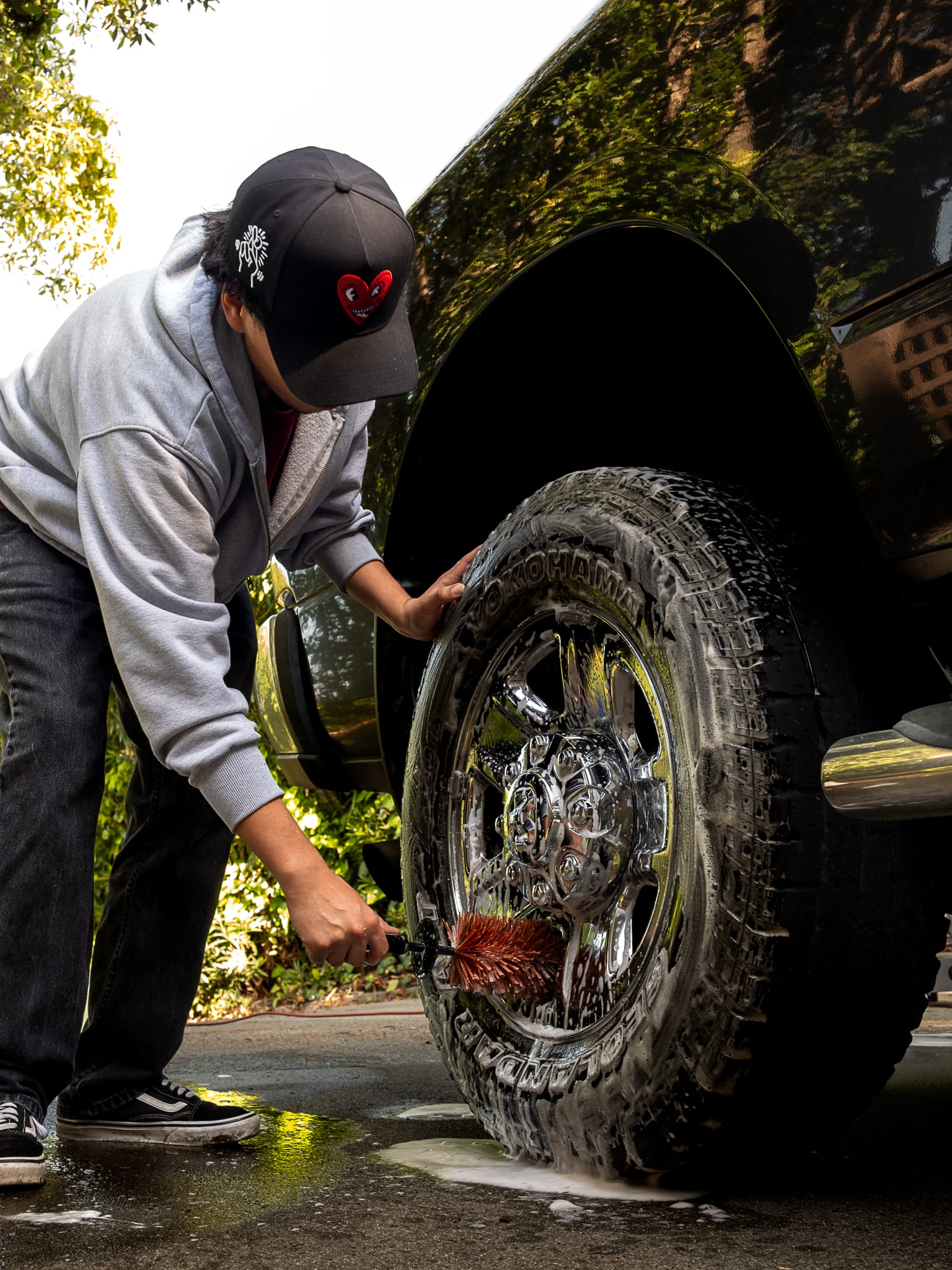 Hand-washing a Ram truck wheel